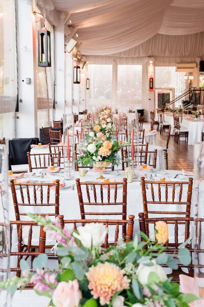 Romantic wedding reception floral design by Leigh Florist with cascading greenery and white flowers at the Manor House at Prophecy Creek