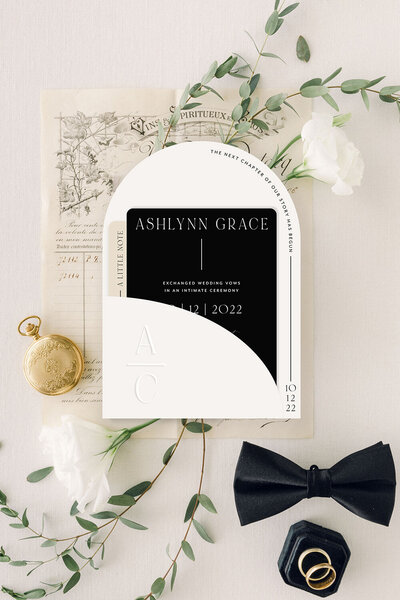 Modern arch pocket featuring a neutral-toned invitation suite, showcasing elegant invitation ideas with a sophisticated design that blends contemporary style with refined craftsmanship.