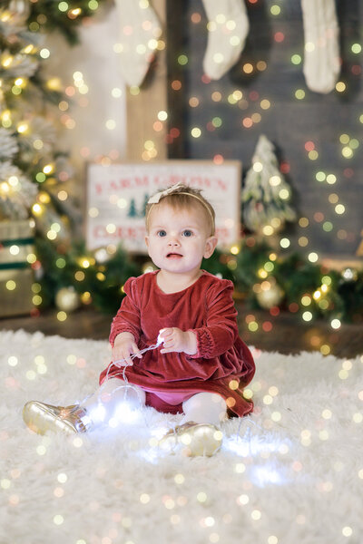 boy-smiling-with-christmas-tree