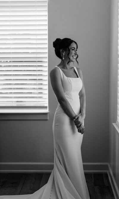 Bride getting ready at River House Events in St. Augustine, Florida—capturing intimate bridal moments in a waterfront wedding venue, planned by Watters & Co. Events.