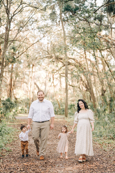South Florida Family Photographer captures family walking during their photo session