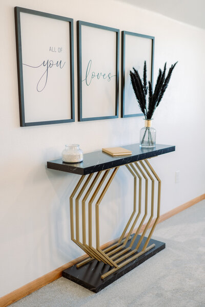 Black and Gold Bedroom Decor for overnight guests at The Era Wedding & Event Venue