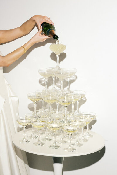 Close up of bride and groom's arms next to each other
