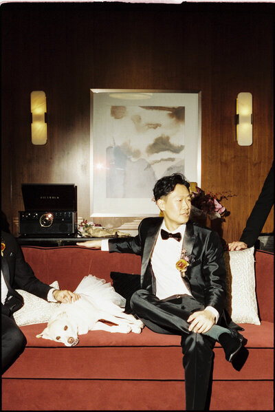35mm film photo of groom and his dog