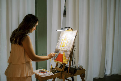 Sloan painting on a canvas