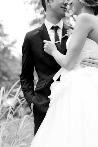 Groom kisses his bride after wedding at  Brooklyn Arts Center wedding in downtown Wilmington.