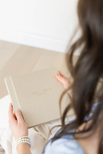 Candid family photo taken at Lambert Park in Alpine, Utah, featuring a precious moment between cute children and their parents, captured by a Utah family photographer specializing in natural and timeless portraits.
