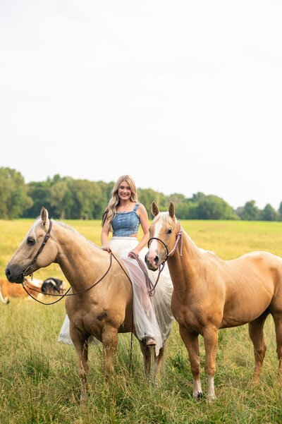 senior boy with horse and dog
