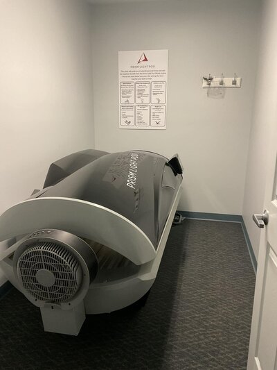 Red light therapy room at Albright Wellness Clinic, designed for skin rejuvenation, pain relief, and wellness support.