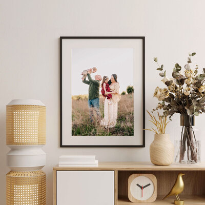 family photo in Branson MO captured by The XO Photography framed above dresser
