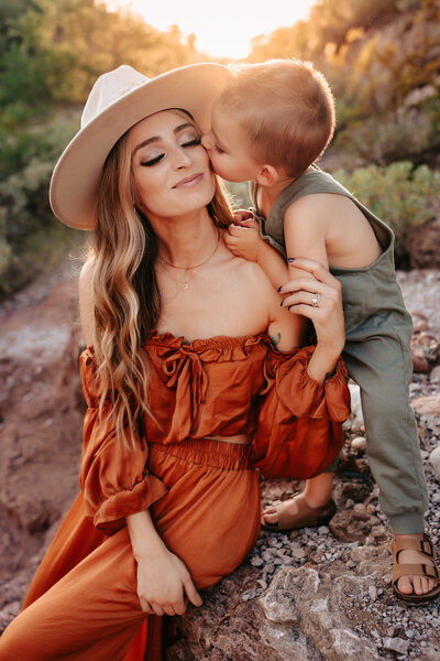 Mother being kissed by son