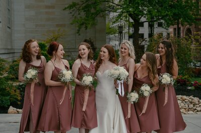 bride with her bridesmaids