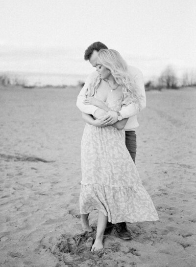 Seattle outdoor maternity photoshoot in the sand at Golden gardens