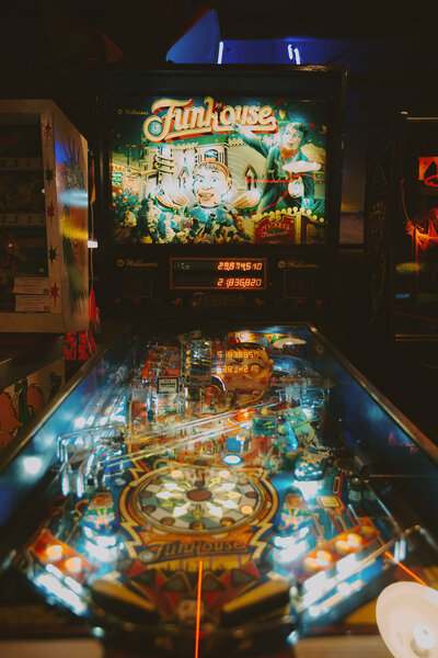 Vintage pinball machine at a wedding cocktail hour