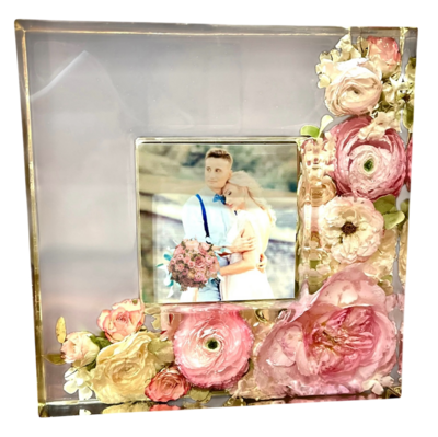 beautiful wedding pink and white wedding flowers preserved in a resin frame that holds a 4x4 frame