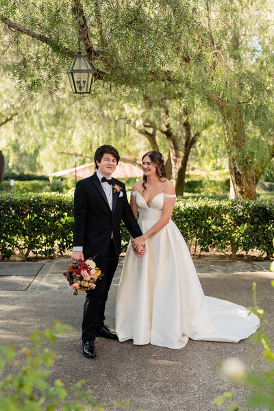 Bride and Groom standing together at their wedding at Rancho Bernardo Inn