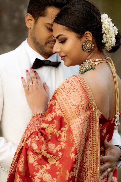 cute-indian-couple-cuddling-during-London-wedding-photography-at-st-dunstan-in-the-east-garden
