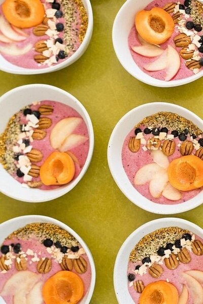 Smoothie bowl photo. The colors in the photo match the retro inspired color palette.