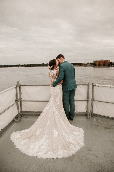 Couple Celebrating elopement on the OSS Orleck located on the  riverbank of Jacksonville Florida