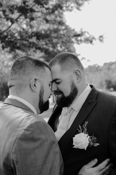 Couple leaning their heads together 