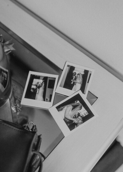 Black and white polaroids of bride and groom