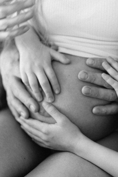 big brother touching tummy
