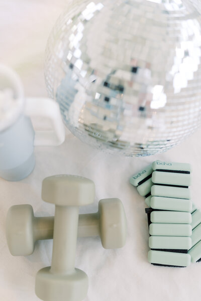 bala bangles, disco ball and hand weights