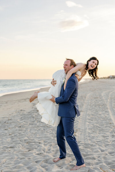 Bride and groom kissing on courthouse steps, intimate Wilmington courthouse wedding photography