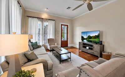 Bright living area of this 3-bedroom, 2-bathroom vacation rental home near the Silos and Baylor in Waco, TX