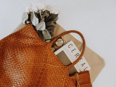 vintage terracotta purse with magazine