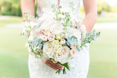 Wedding Photography in Orlando FL. Bride holding flowers