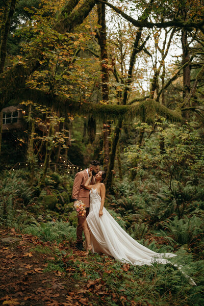couple in forest on wedding day