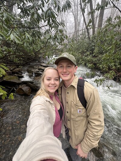 Tyler and Kennedy, a destination wedding couple, explore a national park