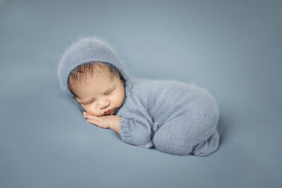 newborn baby sleeping for photos at photography studio in Princeton, New Jersey.