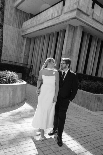 Couple looking at each other and posing for one of the best orlando engagement photographers, Marissa Nicole Photography