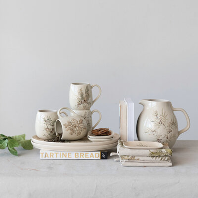 Stoneware vessel with debossed botanical design