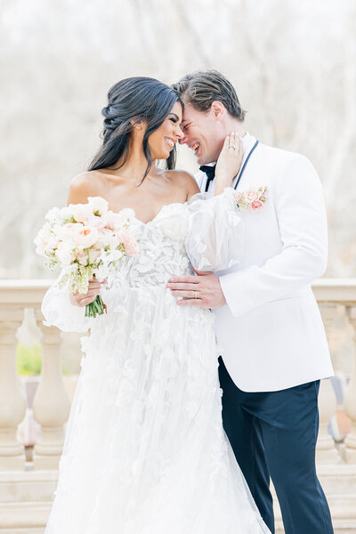 Bride and groom walk up memorial steps at their DC wedding