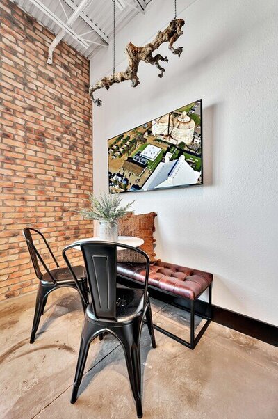 Cozy seating nook in this one-bedroom, one-bathroom luxury condo in the historic Behrens building in downtown Waco, TX.