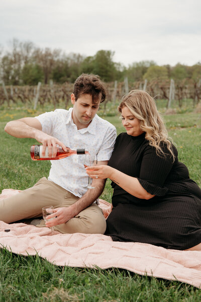 romantic wine filled engagement photo session at fulkerson winery in Dundee new york