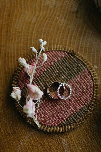 minimalist detail shot of wedding rings at a prince edward county wedding venue called the Brighthouse. Image by talented Prince Edward County photographer Jennifer van Son