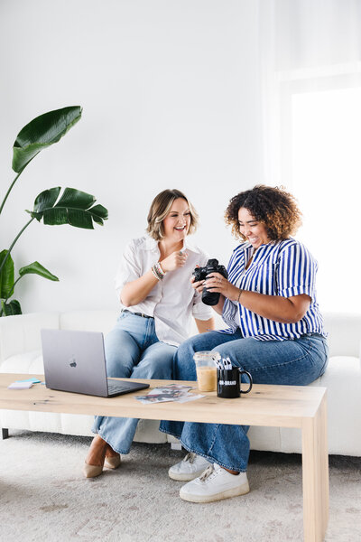 Chelsea writing on calendar for interior design clients