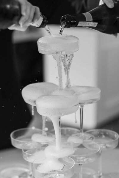 A timeless wedding photo of a bride and groom during a candid moment during their ceremony at Whitehall in Louisville, KY