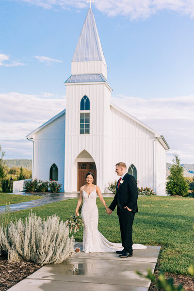 Mom, Dad, and son stand in a field in Knoxville, TN