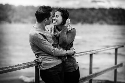 Black and white family portrait at a dock in the Seattle area.