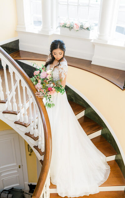 Gorgeous bride during bridal portraits on the staircase at Great Marsh Estate in Bealeton, Virginia. Captured by Charlottesville Wedding Photographer Bethany Aubre Photography.