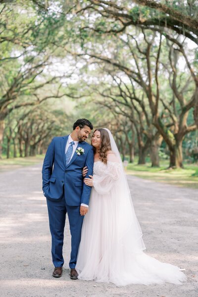 A exquisite portrait of Kirby + Wendiam after their elopement ceremony at Forsyth Park, "The Low Branch" in Savannah, captured as part of our Savannah Elopement Package.