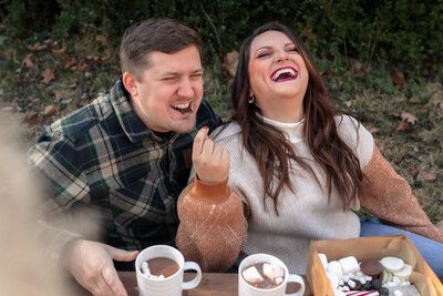 couple sitting laughing