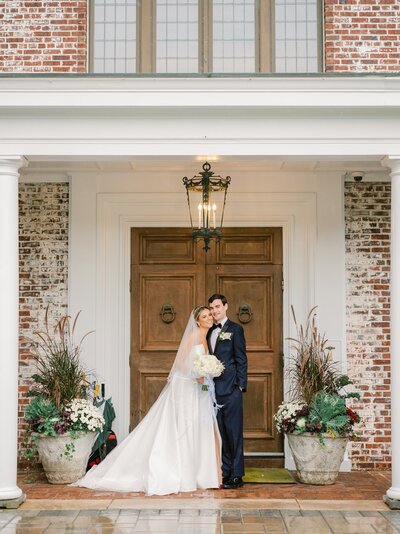 Olivia and Robert posing in front of Hamilton Farm Golf Club