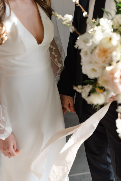 close up of Cincinnati bride and groom holding hands