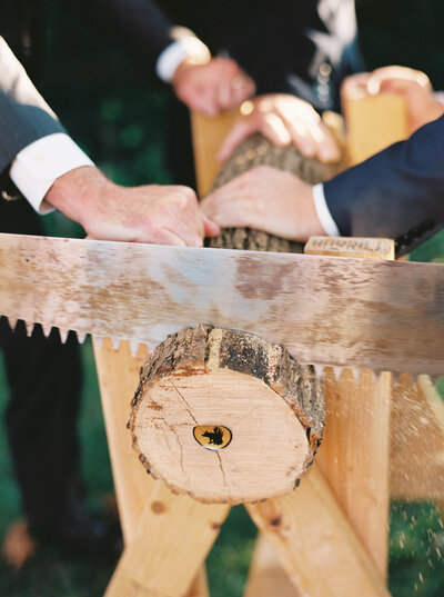 Wedding guests chopping wood